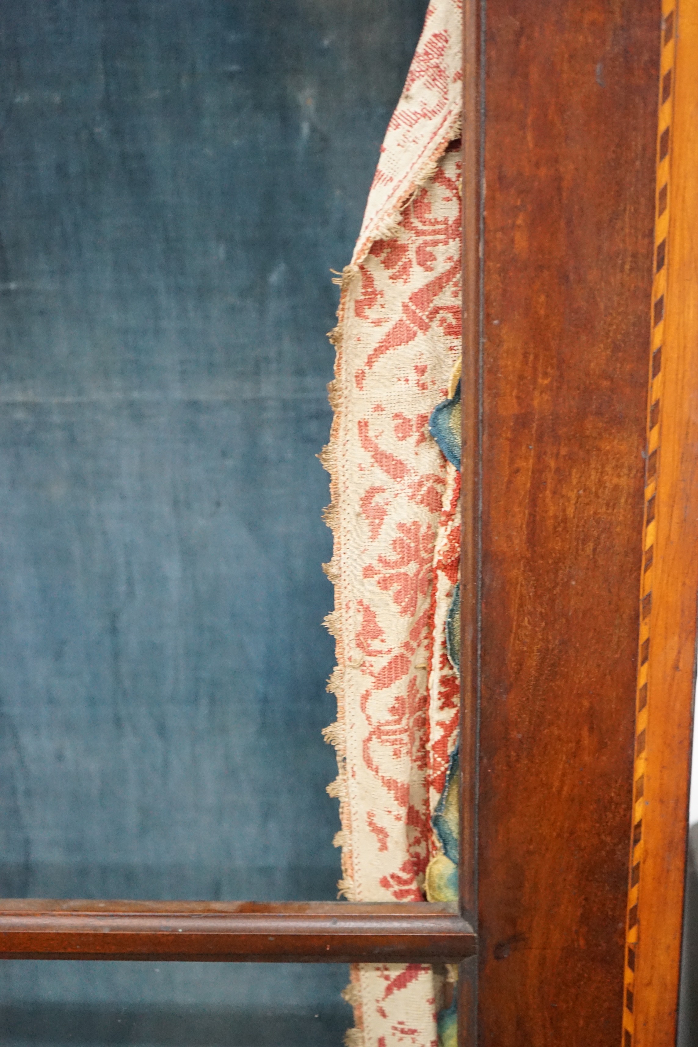 An 18th century Dutch walnut and fruitwood vitrine, with two glazed doors, width 148cm, depth 35cm, height 202cm